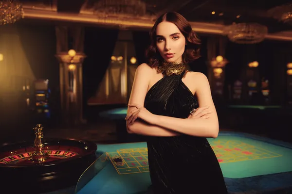 CROWNDB Jackpot Slots — Spin for massive rewards A dramatic shot of winning sevens landing on a slot reel surrounded by shining gold coins, symbolizing big wins.